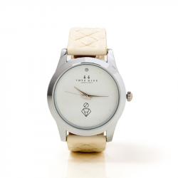 perla’s Beige mothers watch with small white stone